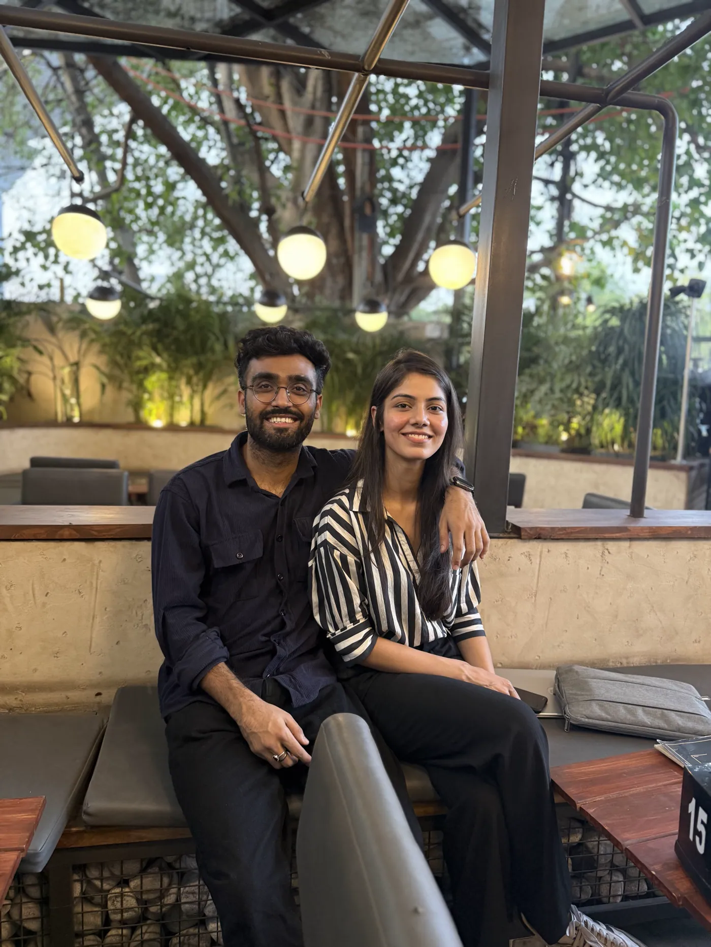 The two of us on a bench in warm light