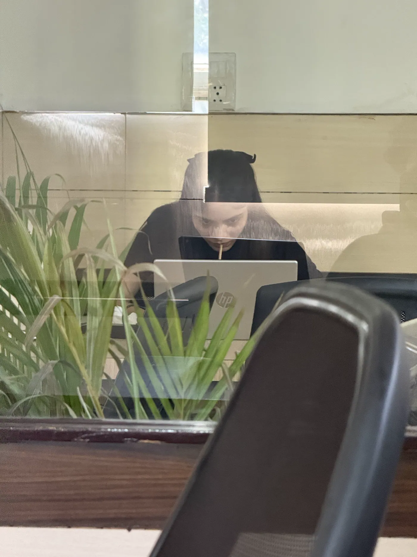 Aiko working at her desk